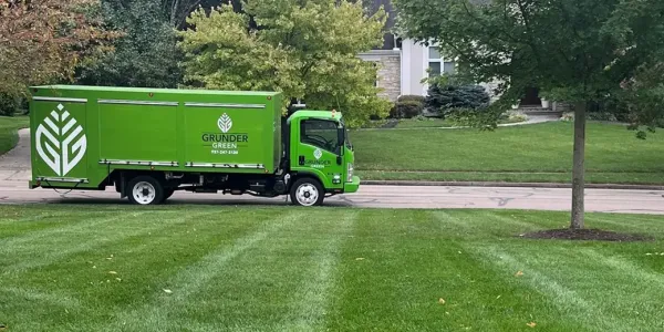 Grunder Green Truck next to home
